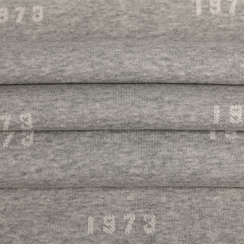 32s Celese + 100D/36F gerecycled polyester + 10s Celese jacquardfleecestof